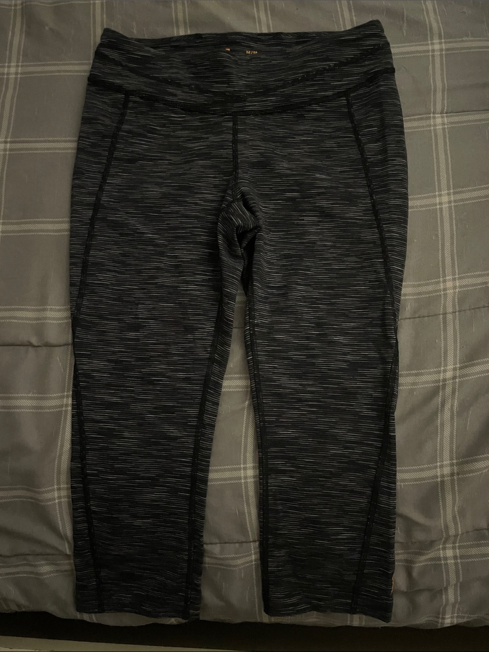 Lucy black with white stripes 7/16th leggings.